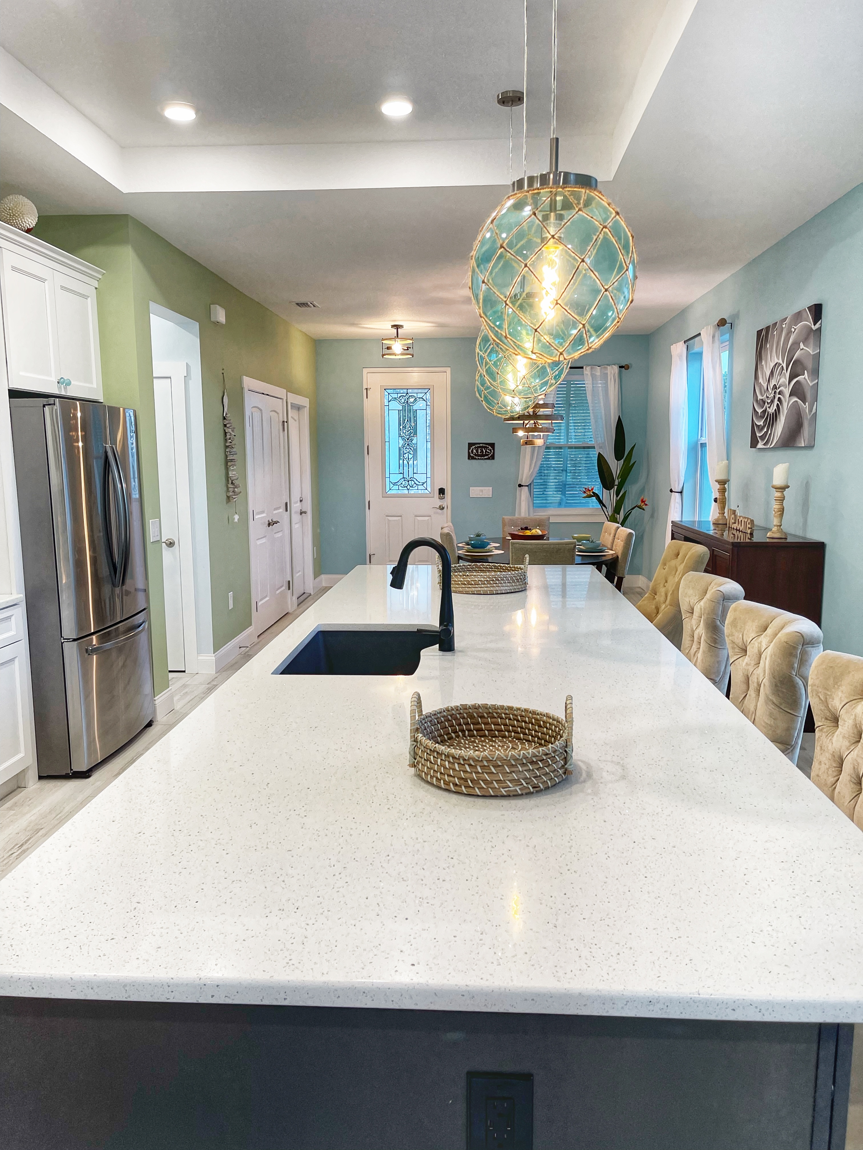 Kitchen island and dining room view